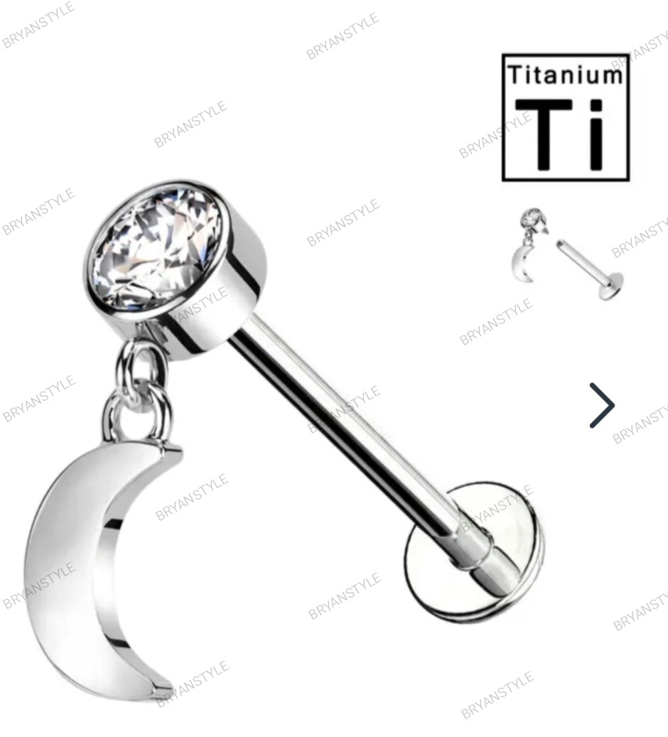 piercing labret in titanio con punto luce e pendente a forma