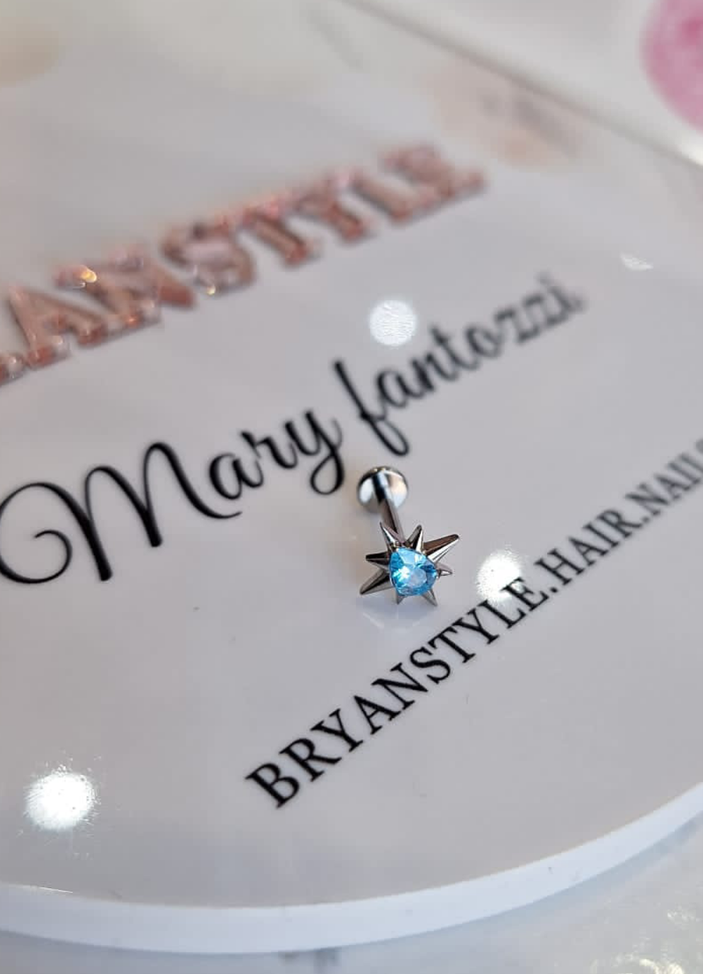 piercing labret in titanio con stella e cristallo a goccia
